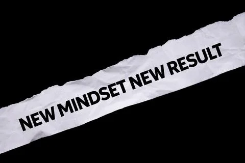 New mindset new result message written on ripped torn white paper on black .. Stock Photos