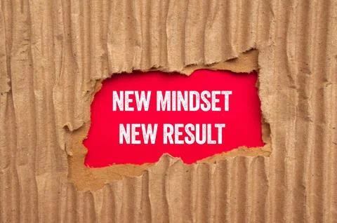 New mindset new result message written on ripped torn cardboard paper on re.. Stock Photos