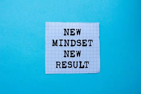 New mindset new result message written on ripped torn white paper on blue b.. Stock Photos
