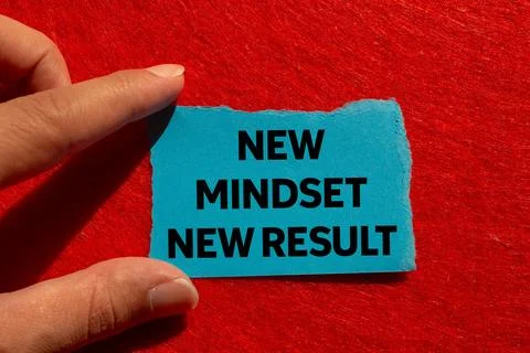 New mindset new result message written on ripped torn blue paper on red bac.. Stock Photos