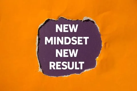 New mindset new result message written on ripped torn orange paper on purpl.. Stock Photos