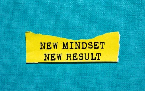 New mindset new result message written on ripped torn yellow paper piece on.. Stock Photos