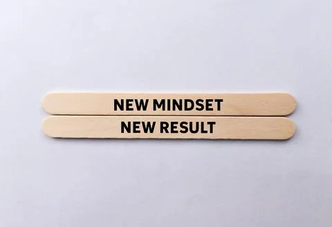 New mindset new result message written on wooden sticks on white background.. Stock Photos