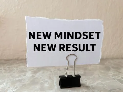 New mindset new result message written on ripped torn white paper piece on .. Stock Photos