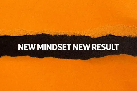 New mindset new result message written on ripped torn orange paper on black.. Stock Photos