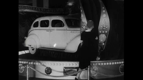 New model of car showcased, workers work in automobile industry - 1943 Stock Footage 95198261