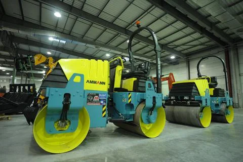 New model of road rollers Ammann parked on a stand Stock Photos
