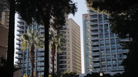 New modern high buildings in Tel Aviv. New residential skyscrapers in quite calm Stock Footage 183397915