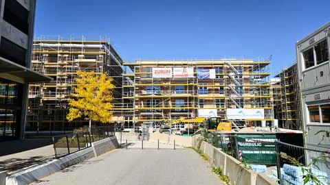New modern housing development under construction with bright autumn trees Stock Photos