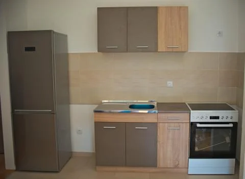 New modern kitchen, front view Stock Photos