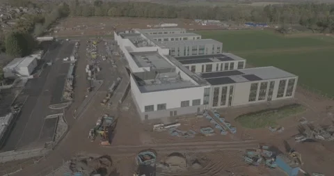 New Modern School Work Site Large Building Aerial View Warwickshire UK D-Log Vídeos de archivo 230490723