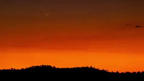 New Moon Sets in Orange Sky Time Lapse Stock Footage 280867301