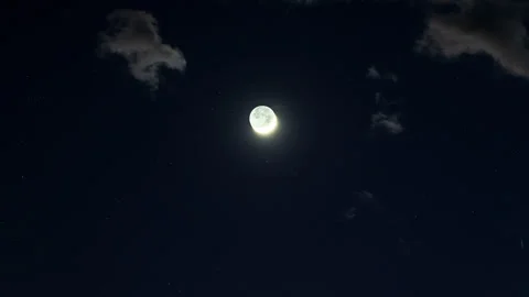 New Moon Sets Through Dramatic Cloudscape Time Lapse. Stock Footage 279912596