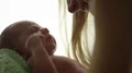 New Mother Kisses Baby Boy in 4K 4k or 4k+ Resolution