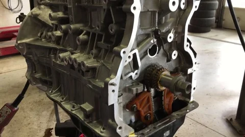 New Motor Suspended by Chains Stockbeeldmateriaal 75796925
