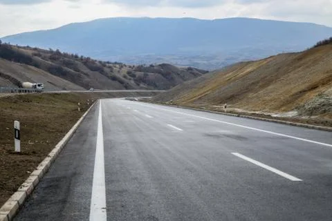 New motorway under construction with dramatic clouds Stock Photos