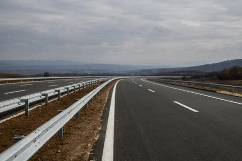 New motorway under construction with dramatic clouds Stock-Fotos