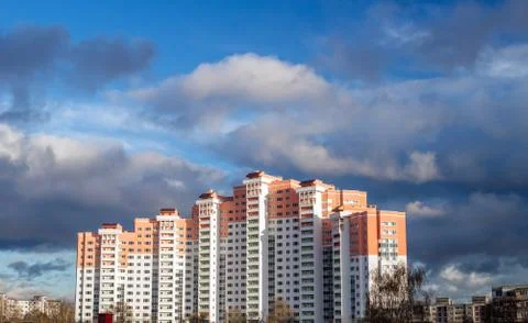 New multi-storey building on a background of blue sky 写真素材