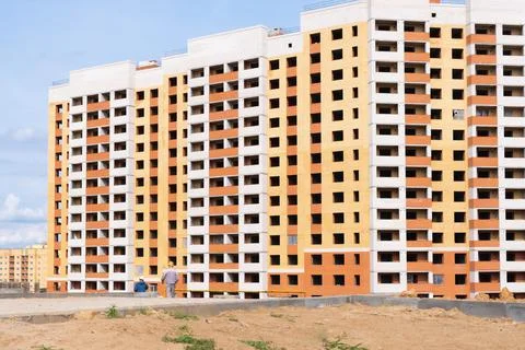 New multi-storey building on a construction site without Windows Stock Photos