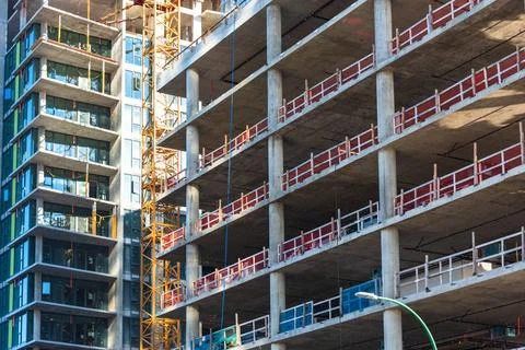 New multi-storey buildings under constraction close up. New multi-storey b... Stock Photos