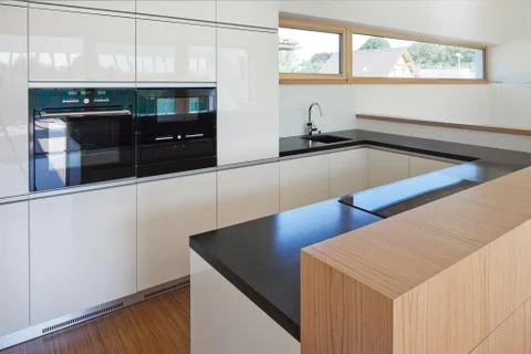 New nice kitchen in interior of new house Stock Photos