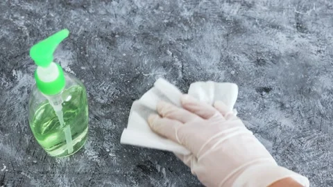 The new normal after covid-19, hand using disinfectant wipe and hand sanitize Stock Footage 136138583