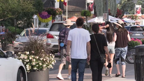 New normal after COVID with crowds of people outside enjoying a festival 動画素材 156407165