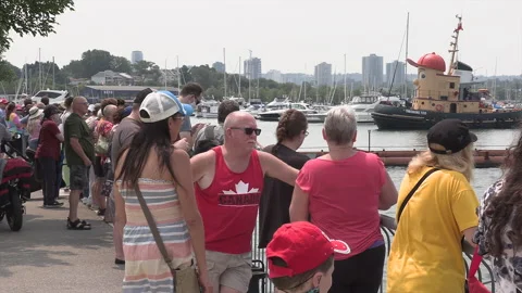 New normal after COVID with crowds of people outside enjoying a festival Stock Footage 157614856