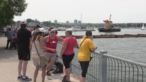 New normal after COVID with crowds of people outside enjoying a festival Stock Footage 157614900