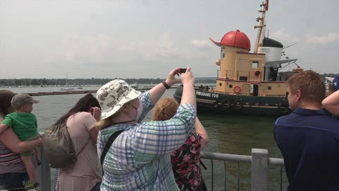 New normal after COVID with crowds of people outside enjoying a festival Stock Footage 157618655