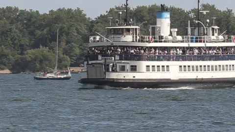 New normal after COVID with crowds of tourists and people in city and boats Video stock 158899230