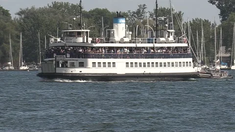 New normal after COVID with crowds of tourists and people in city and boats Video stock 158899278