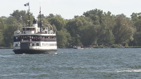 New normal after COVID with crowds of tourists and people in city and boats Video stock 158899400