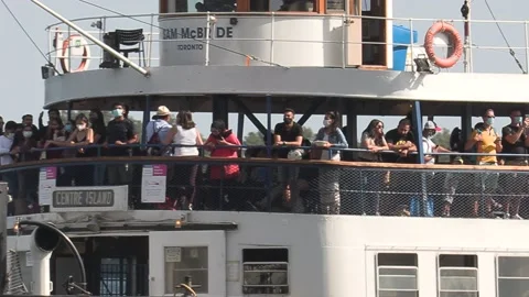 New normal after COVID with crowds of tourists and people in city and boats Video stock 158899652