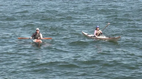 New normal after COVID with crowds of tourists and people in city and boats Video stock 158900061