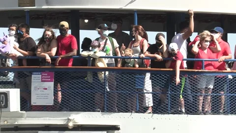 New normal after COVID with crowds of tourists and people in city and boats Stock Footage 158901755