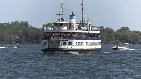 New normal after COVID with crowds of tourists and people in city and boats Stock Footage 158901839
