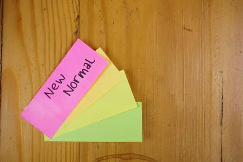 New normal background concept. sticky note on desk work. Coronavirus pandemic Stock Photos