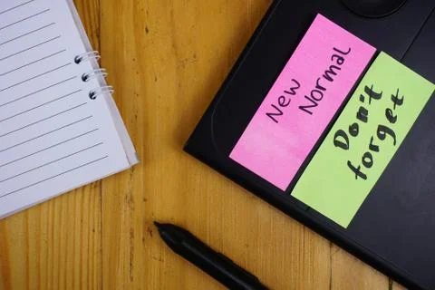 New normal background concept. sticky note on desk work. Coronavirus pandemic Stock Photos