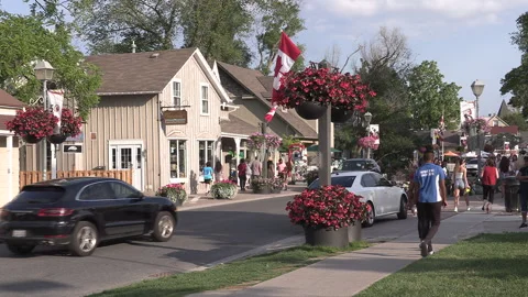 New normal  COVID small town main street Canada with people and face masks Видео 156408122