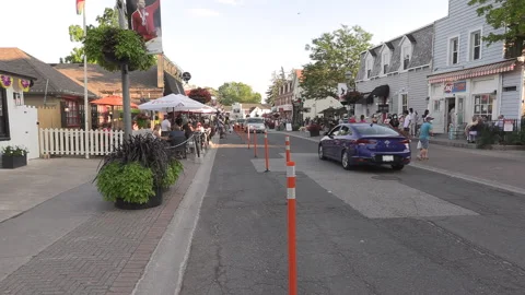 New normal  COVID small town main street Canada with people and face masks Vidéo 156422152