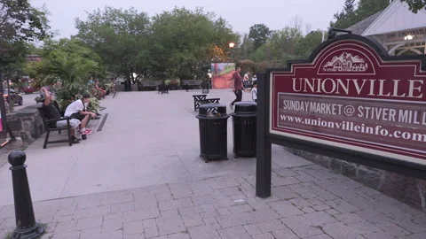 New normal  COVID small town main street Canada with people and face masks Vídeo Stock 157593280