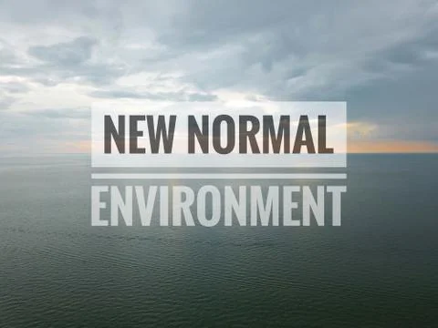 NEW NORMAL ENVIRONMENT text on sky background Stock Photos