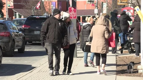 New normal with people walking on sidewalk wearing face masks in COVID pandemic Stockbeeldmateriaal 149994118