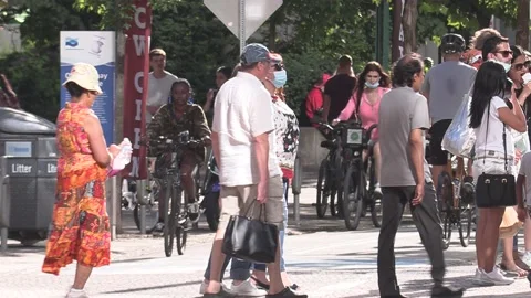 New normal post COVID with crowds of tourists and people in the city and boats Stock Footage 158887940