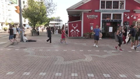 New normal post COVID with crowds of tourists and people in the city and boats Video stock 158904148