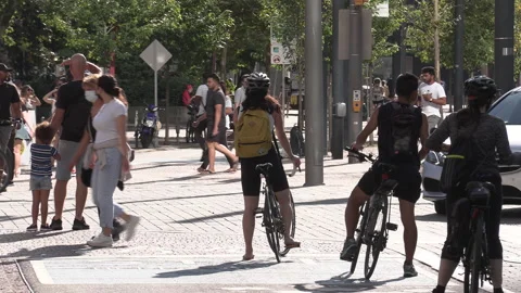 New normal post COVID with crowds of tourists and people in the city and boats Stock Footage 158926229