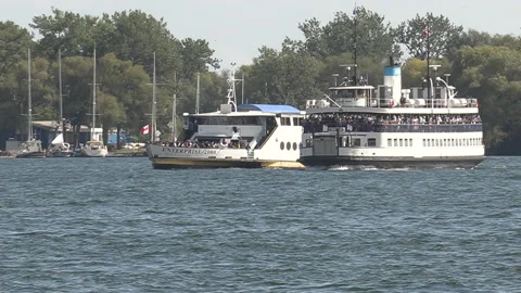 New normal post COVID with crowds of tourists and people in the city and boats Stock Footage 158932840