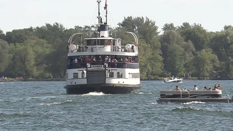 New normal post COVID with crowds of tourists and people in the city and boats Stock Footage 158934940