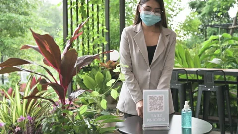 New normal rule QR scan and cleansing hand by alcohol gel before entering cafe Stock Footage 141694734